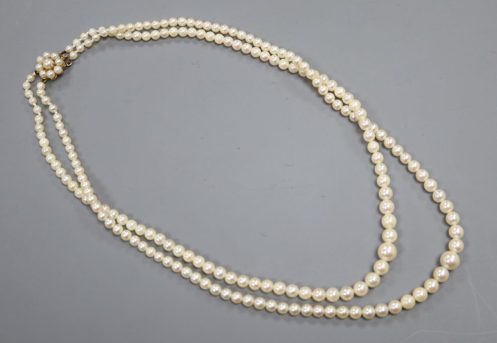 A double row cultured pearl necklace with pearl clasp, 20.5cm drop